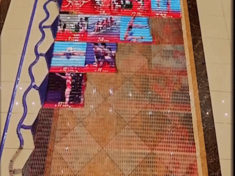 Xep hon 20.000 quan co domino ve nhung khoanh khac dang nho o Olympic hinh anh