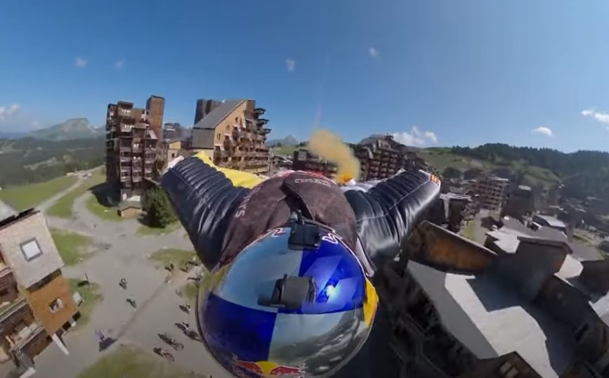 Nguoi dan ong bay xuyen qua khu truot tuyet o Phap hinh anh