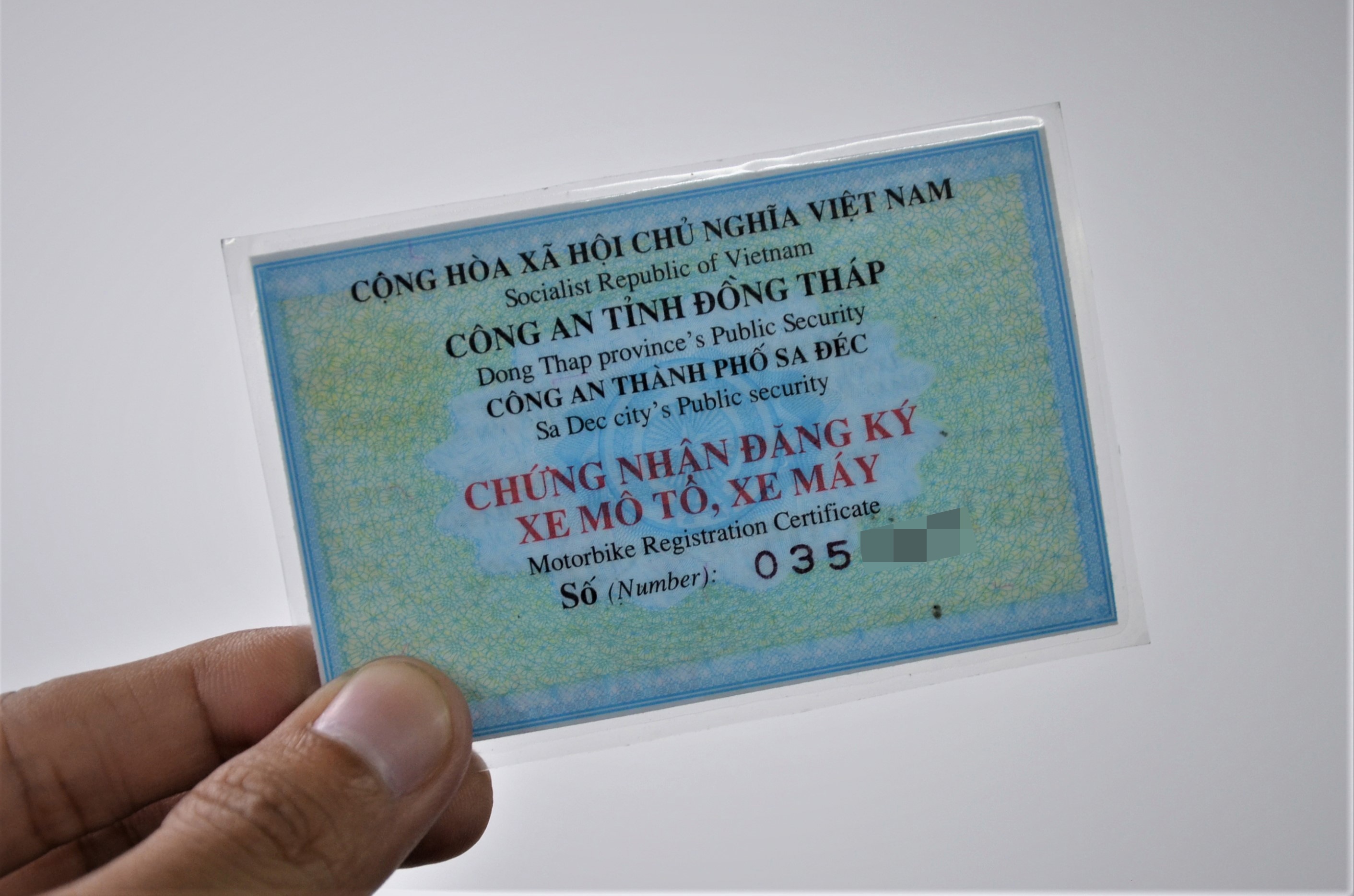 Di xe may khong dem giay dang ky bi phat 300.000 dong? hinh anh