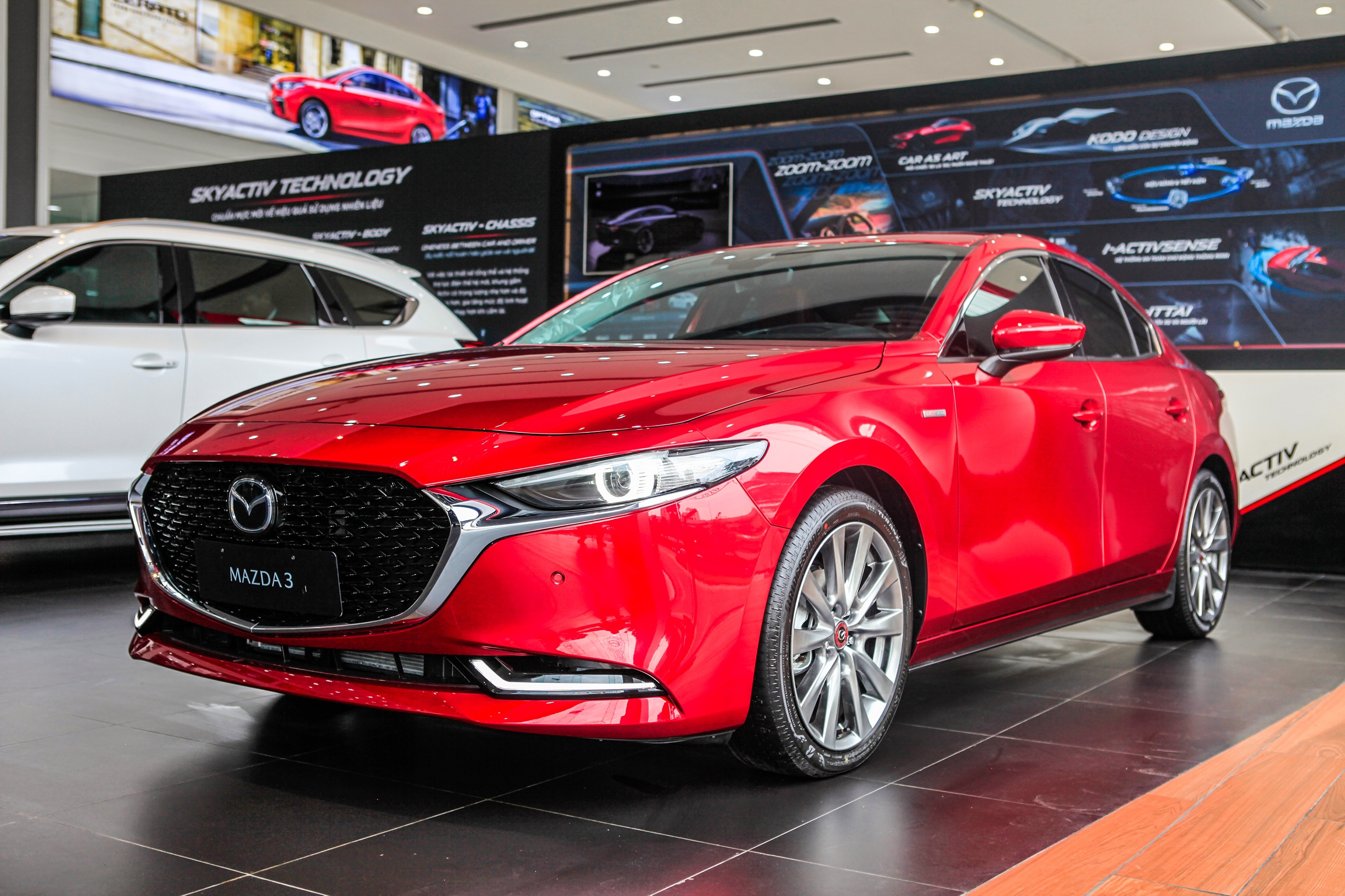 Co 700 trieu dong toi nen mua Mazda3 hay Kia Seltos? hinh anh