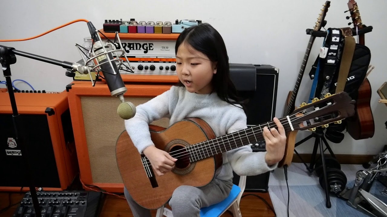thần đồng guitar nhí ảnh 3 than dong guitar nhi anh 3
