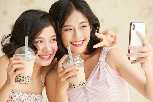 Khung hoang tra sua tran chau o My hinh anh