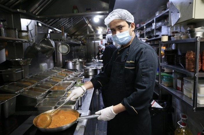 Khu pho An Do o Trung Quoc vang lang vi dich Covid-19 hinh anh