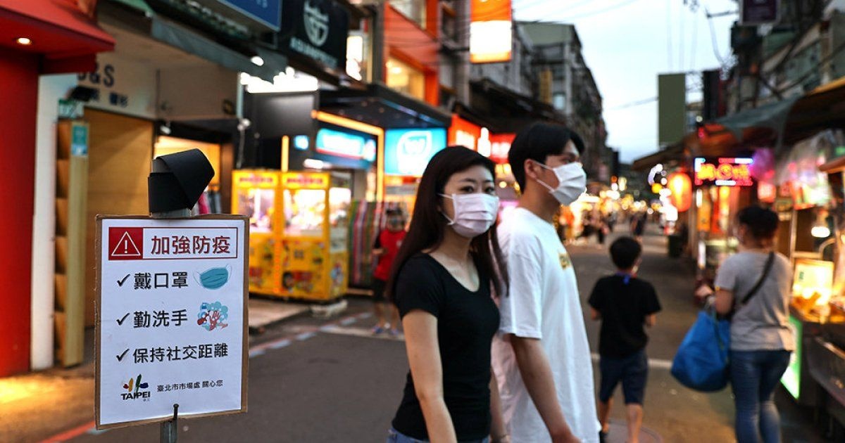 Dai Loan phat hien cac ca nhiem Omicron dau tien den tu 3 nuoc hinh anh