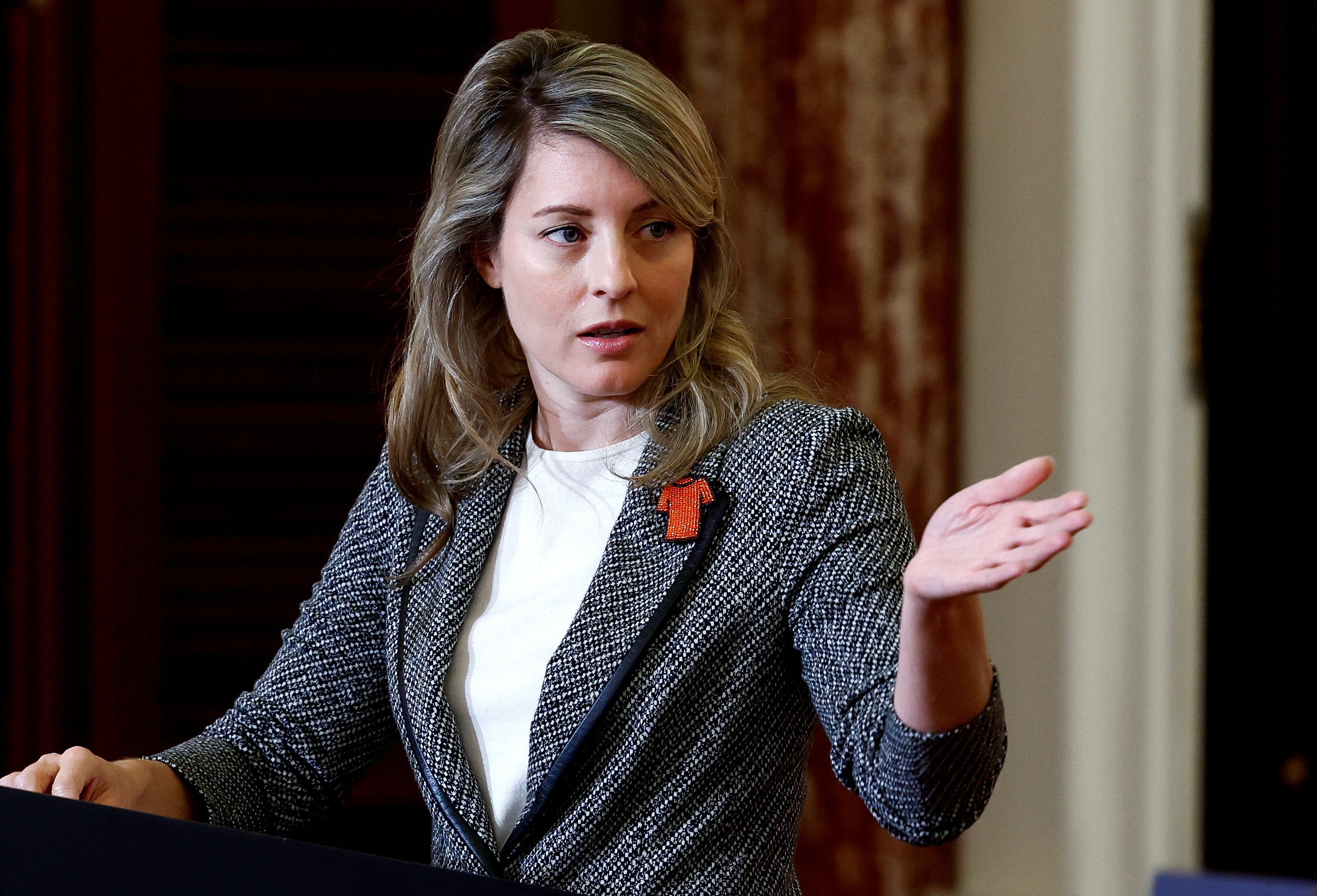 Canada truc xuat nha ngoai giao Trung Quoc hinh anh