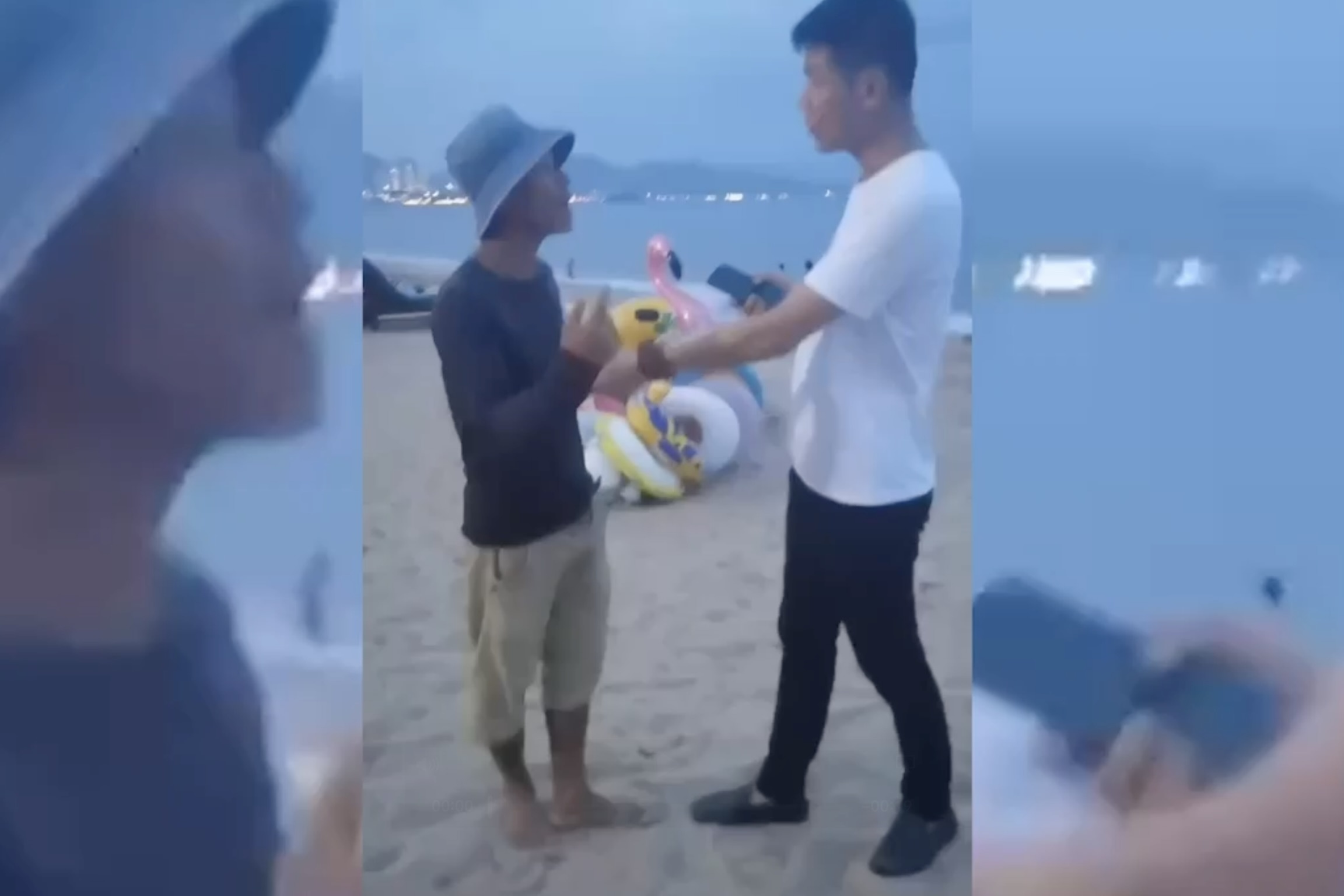 Canh nguoi nam thanh nien cheo keo, thu phi khach Trung Quoc tai bai bien Nha Trang hinh anh