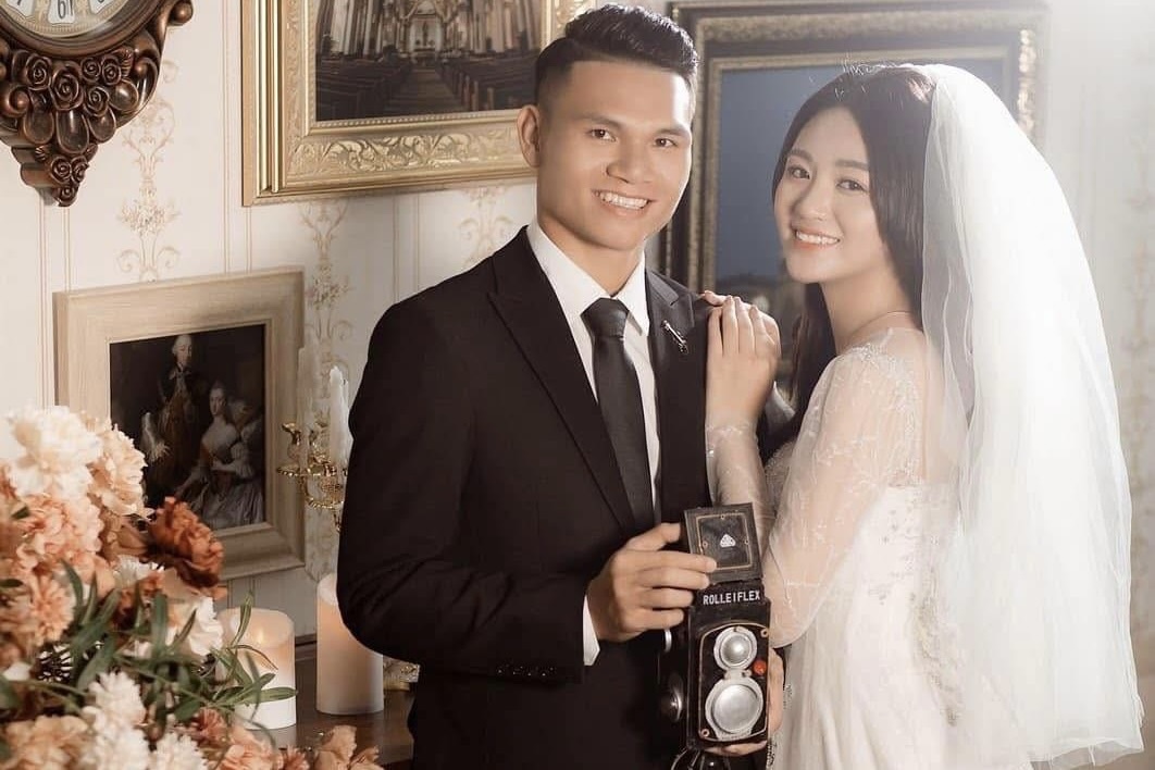 5 nam ben nhau cua Xuan Manh va vo hinh anh