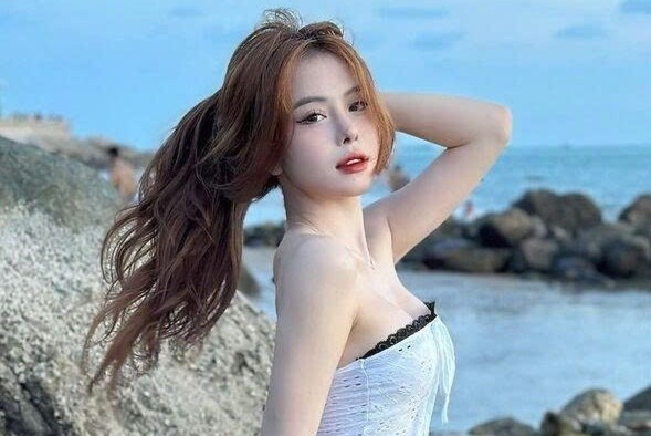 Dong thai cua Ha Moi truoc tin hen ho voi rapper Baus hinh anh