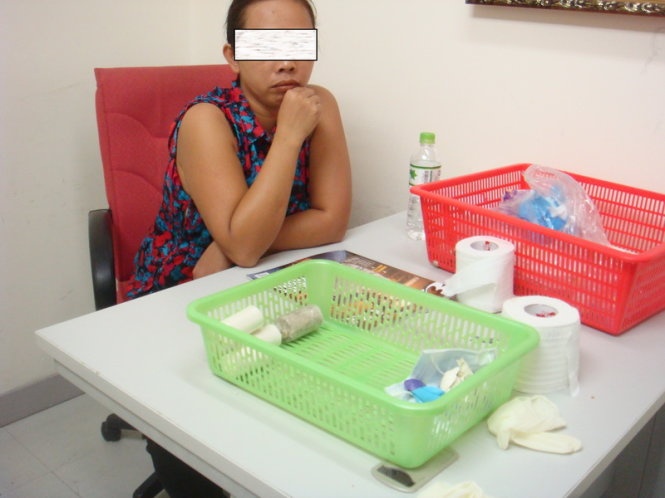 Giau heroin trong vung kin van bi bat qua tang hinh anh