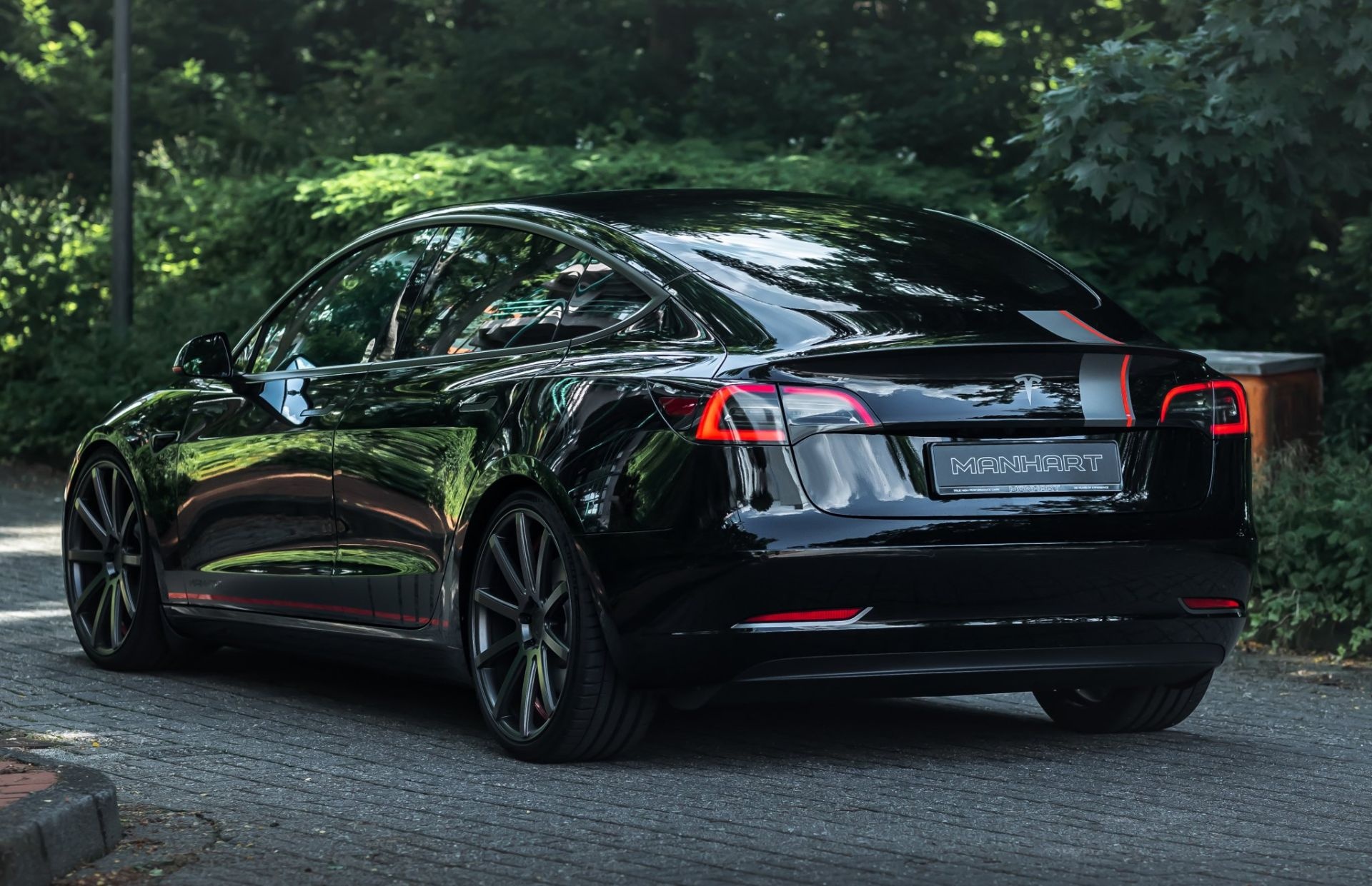 tesla,  model 3,  model 3 performance,  tesla model 3 performance,  manhart,  manhart tm3 700,  tm3 700,  tesla manhart ảnh 6 tesla,  model 3,  model 3 performance,  tesla model 3 performance,  manhart,  manhart tm3 700,  tm3 700,  tesla manhart anh 6