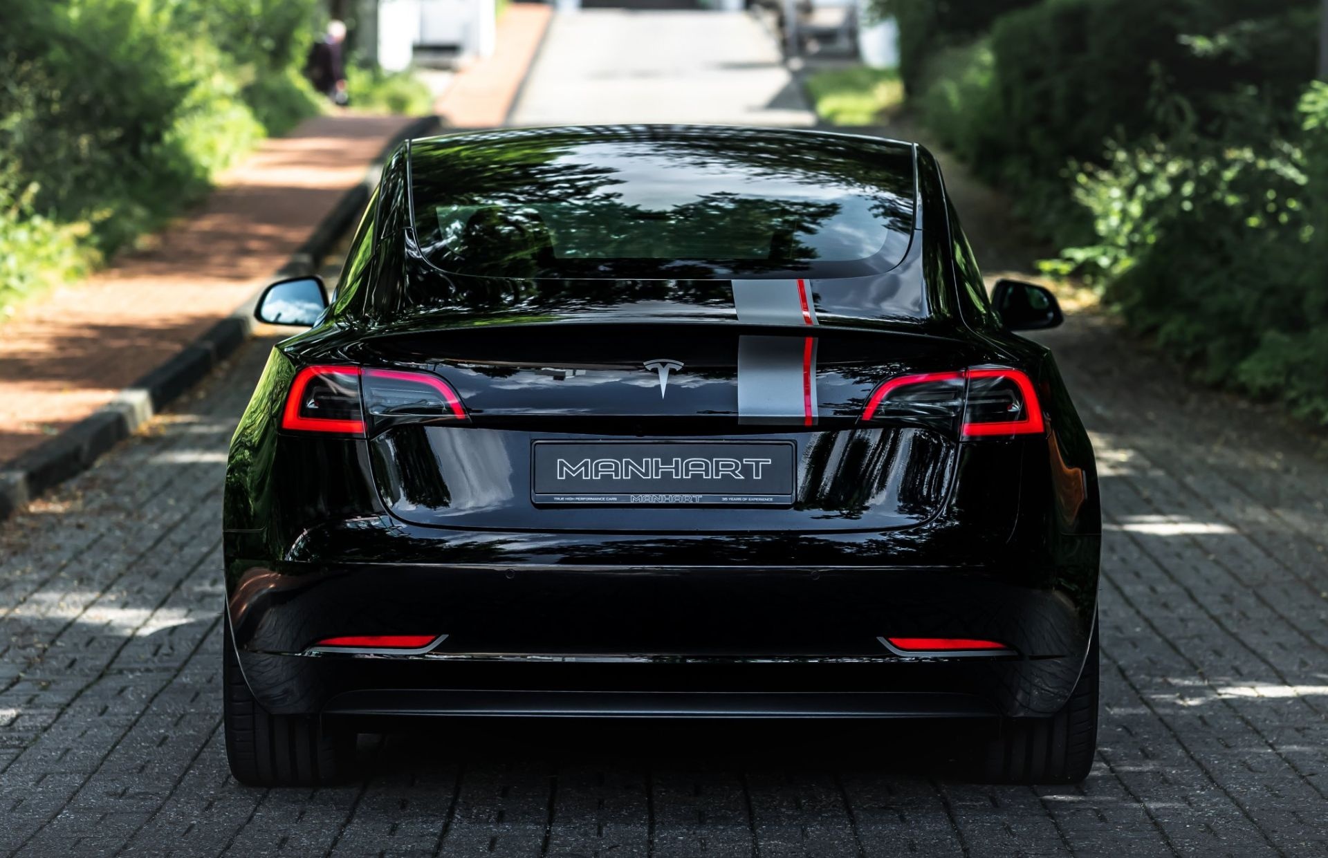 tesla,  model 3,  model 3 performance,  tesla model 3 performance,  manhart,  manhart tm3 700,  tm3 700,  tesla manhart ảnh 5 tesla,  model 3,  model 3 performance,  tesla model 3 performance,  manhart,  manhart tm3 700,  tm3 700,  tesla manhart anh 5