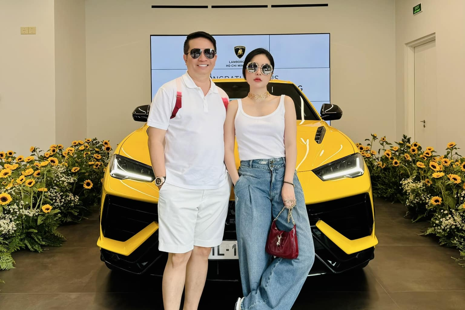 Vo chong Nguyen Quoc Vu - Doan Di Bang tung so huu nhung mau xe gi? hinh anh