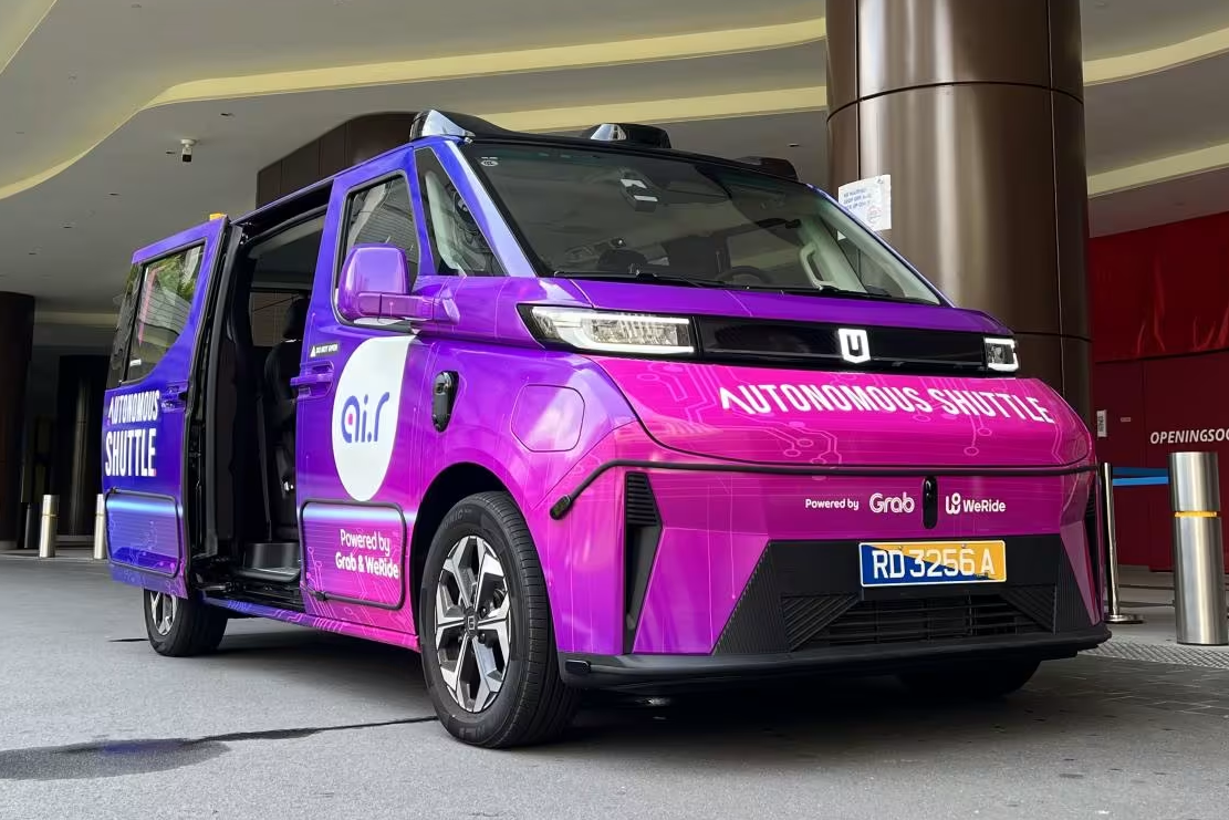 Grab hop tac kinh doanh xe tu hanh tai Singapore hinh anh