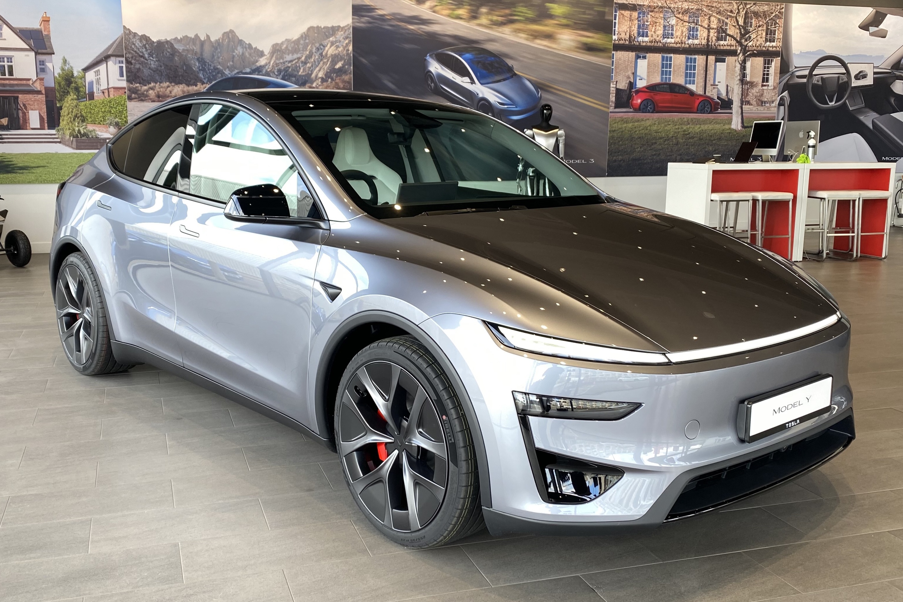 my,  tesla,  dam chat my,  xe thuan dien,  hybrid,  toyota,  honda,  lexus,  canada,  nhat ban anh 2