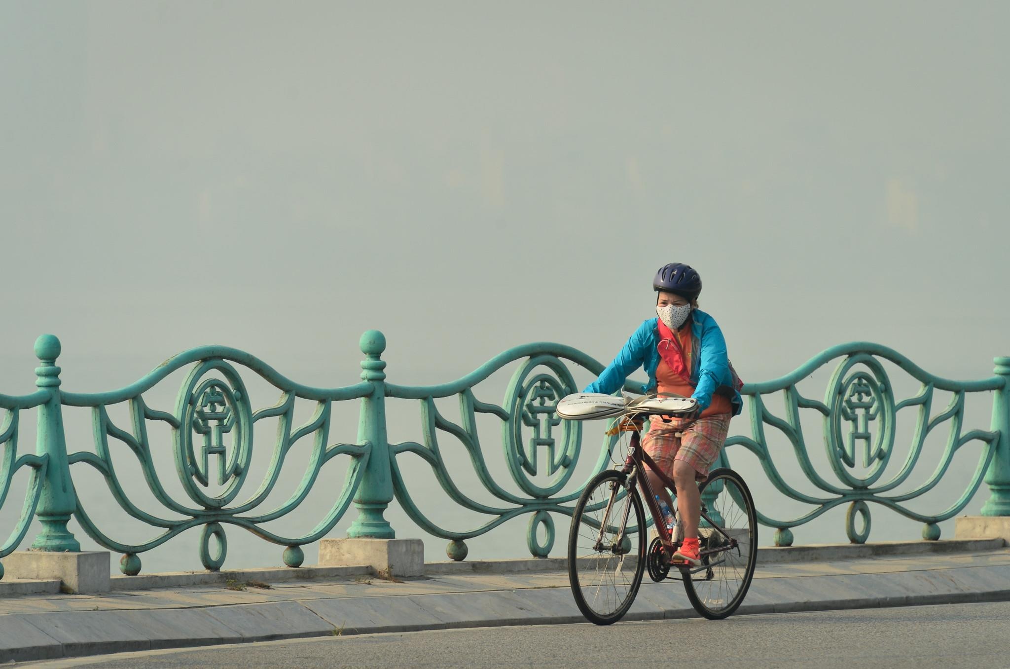 Sau ngay o nhiem, Ha Noi va TP.HCM trong lanh tro lai hinh anh