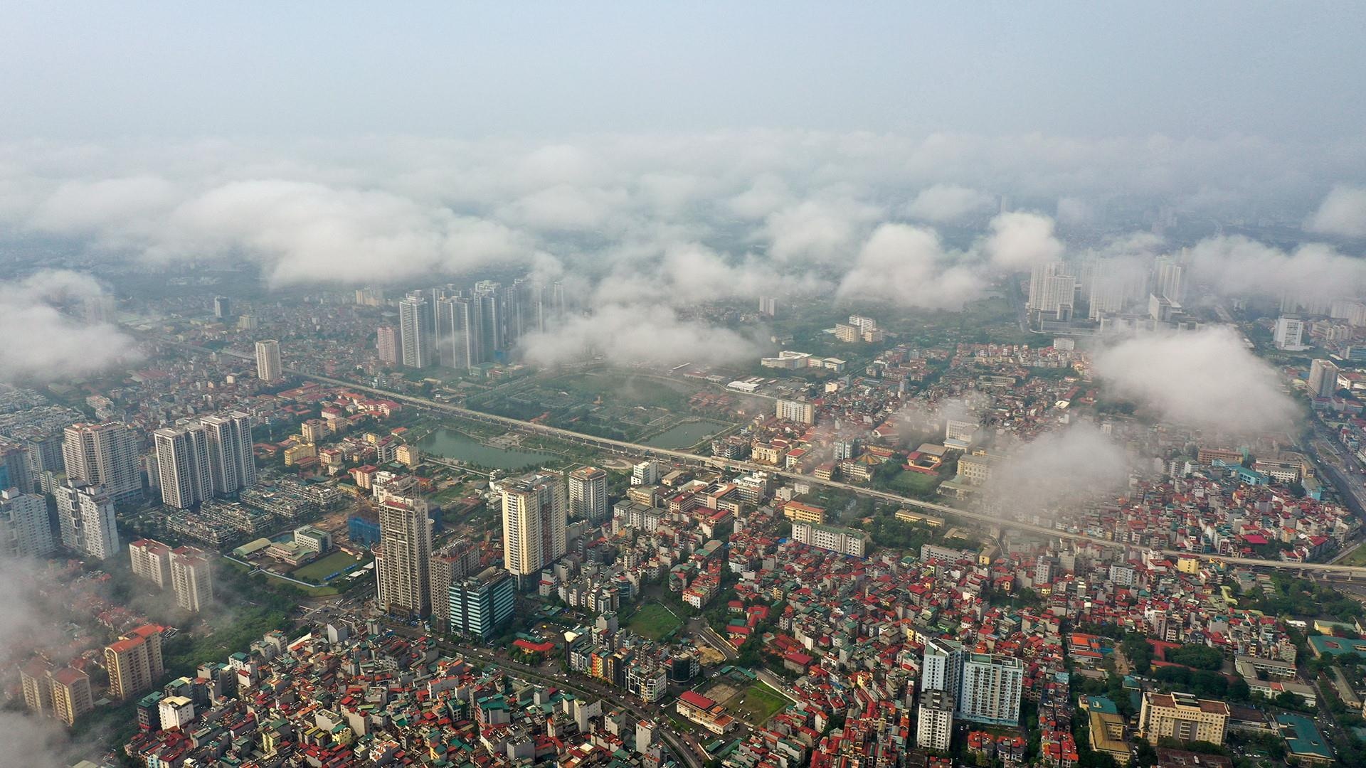 Khong khi Ha Noi va TP.HCM trong lanh sang cuoi tuan hinh anh