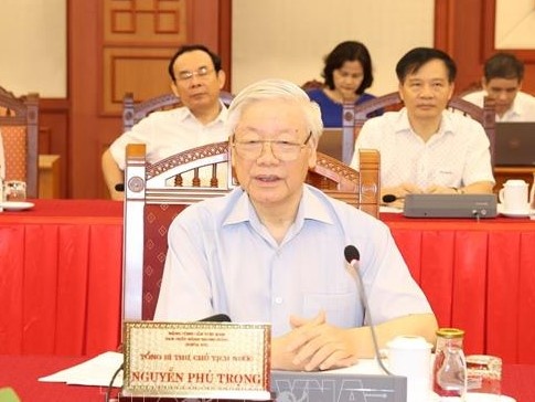 Tap the Bo Chinh tri lam viec voi Ban Thuong vu Thanh uy Ha Noi hinh anh