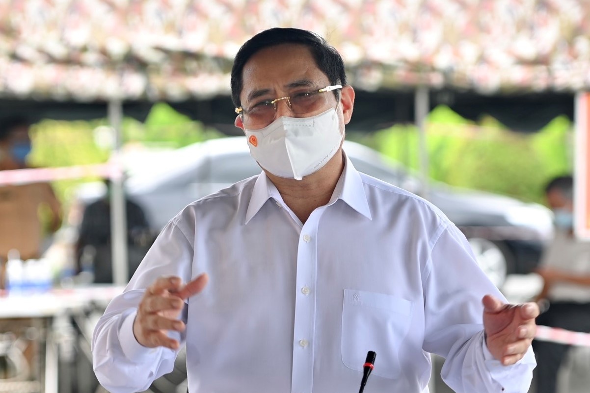 Thu tuong: Vua phong chong dich, vua dam bao bau cu thanh cong hinh anh