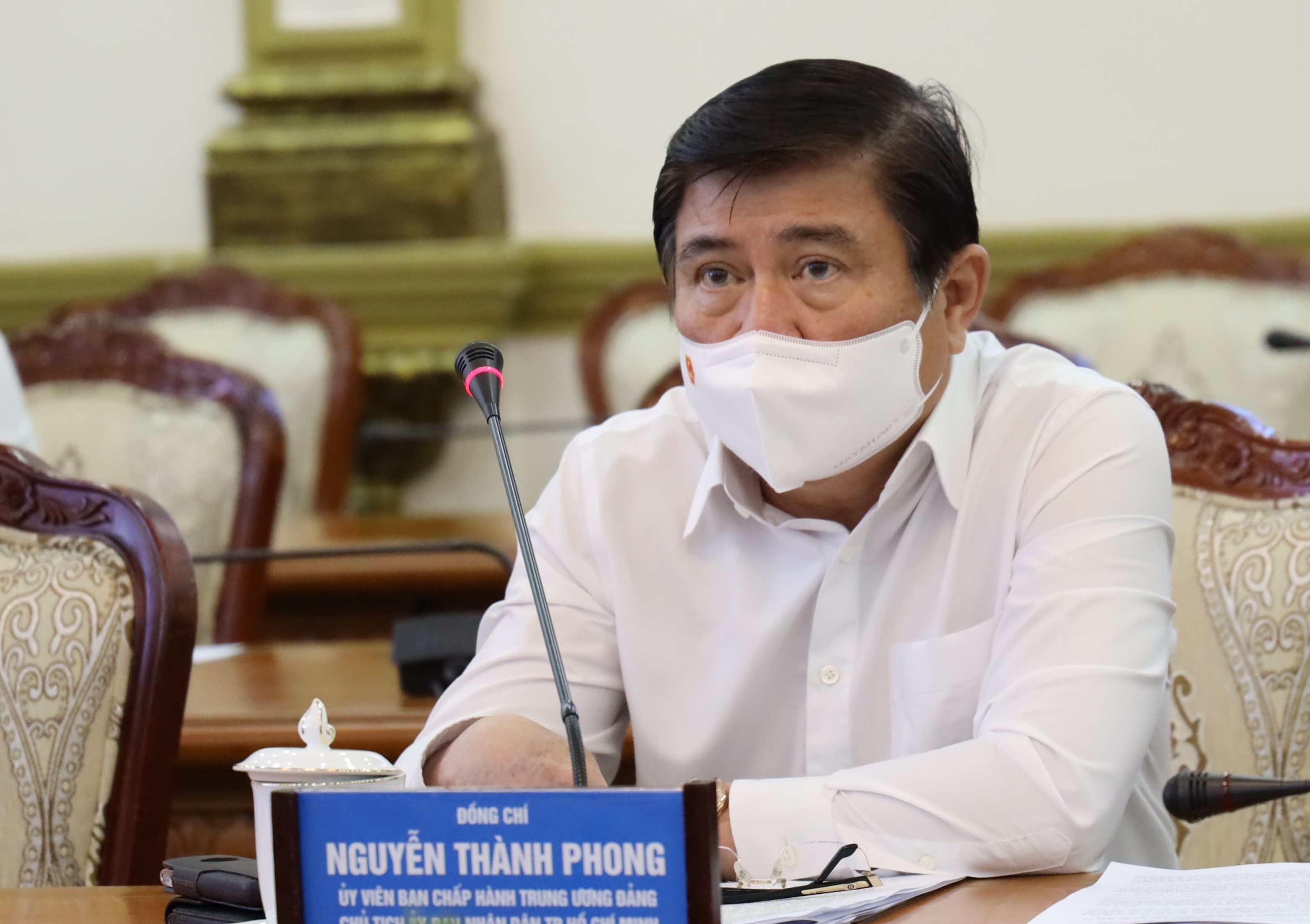 Chu tich TP.HCM: Nguoi co benh ly nen o nha toan thoi gian hinh anh