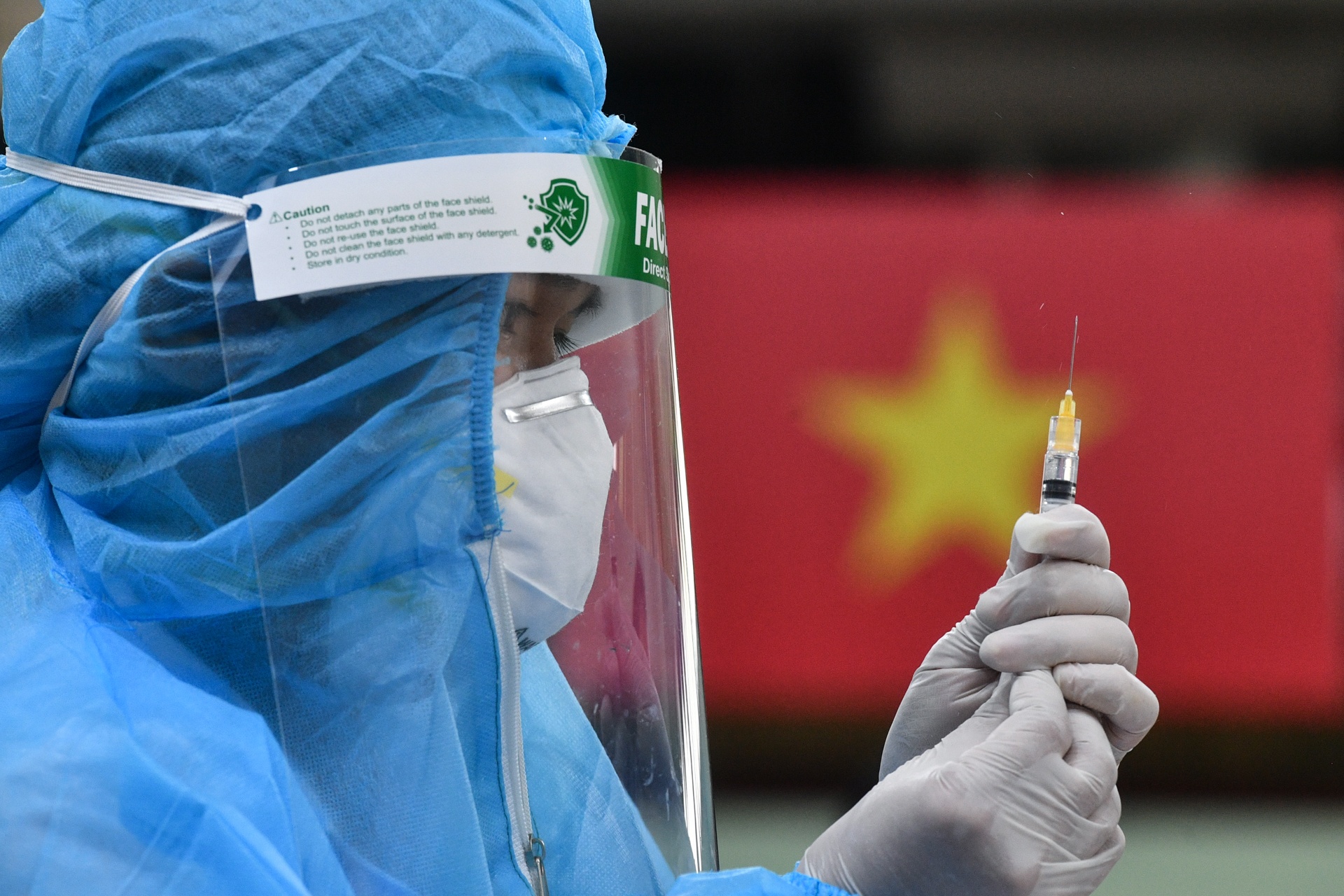 Can tinh toi lien ket vung trong chinh sach vaccine va 'the xanh' hinh anh