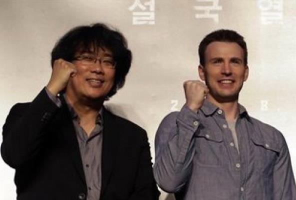 Dao dien ‘Ky sinh trung’ lam tiep 2 phim moi hinh anh