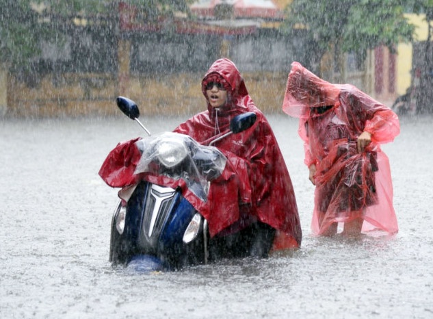 Bao so 7 suy yeu thanh ap thap, mien Bac mua 4 ngay hinh anh