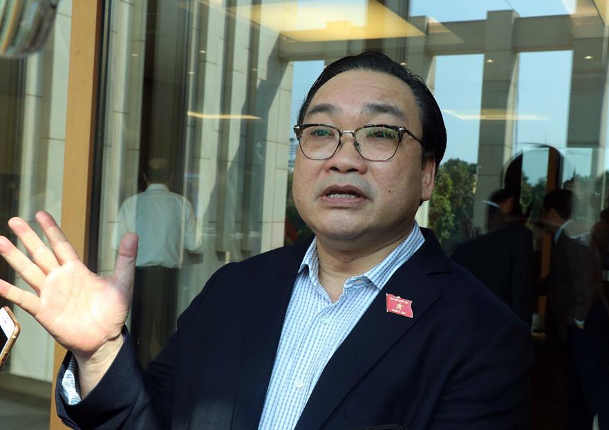 Gan 10 nam sau sap nhap, Ha Noi chua sap xep xong so can bo doi du hinh anh