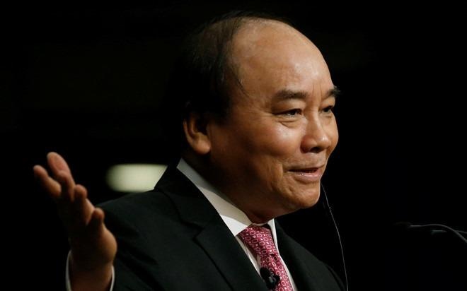 Thu tuong: Khong de tai dien vu phat tien khi doi 100 USD hinh anh