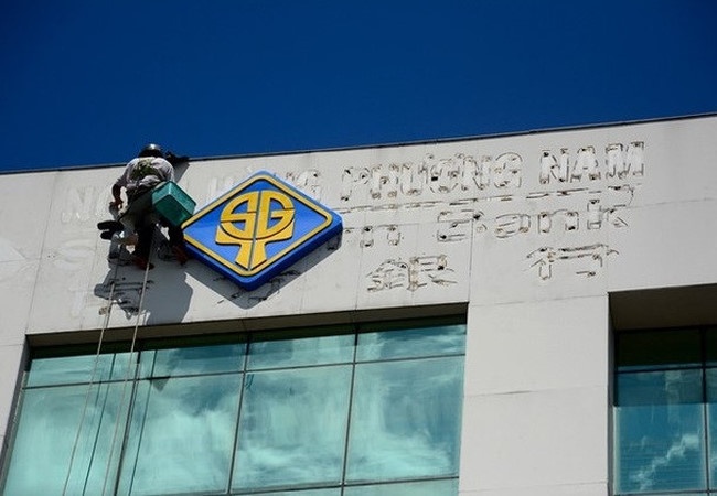 'Luan quan' nhan su cap cao tai Sacombank hinh anh