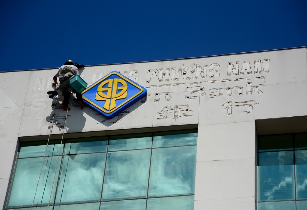 Sacombank bien dong ra sao tu khi vao de an tai co cau? hinh anh