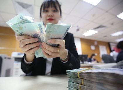 Thuong Tet ngan hang: Da co nha bang hua thuong den 7 thang luong hinh anh