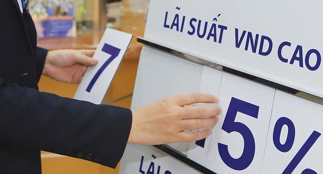 4 'ong lon' ngan hang ha lai suat cho vay 0,5%/nam hinh anh