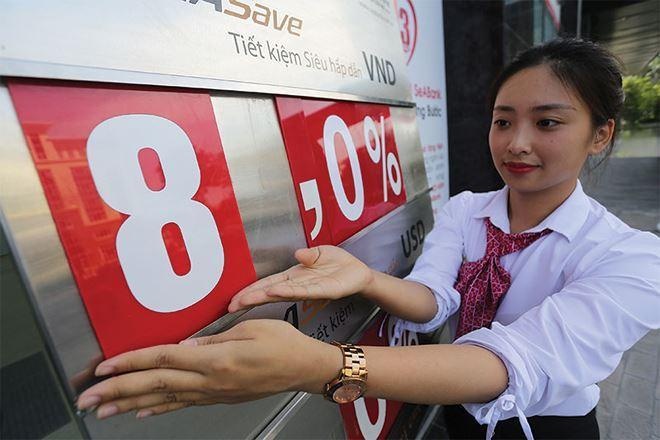 ​NHNN canh bao cac ngan hang co dau hieu ‘dua’ lai suat huy dong hinh anh