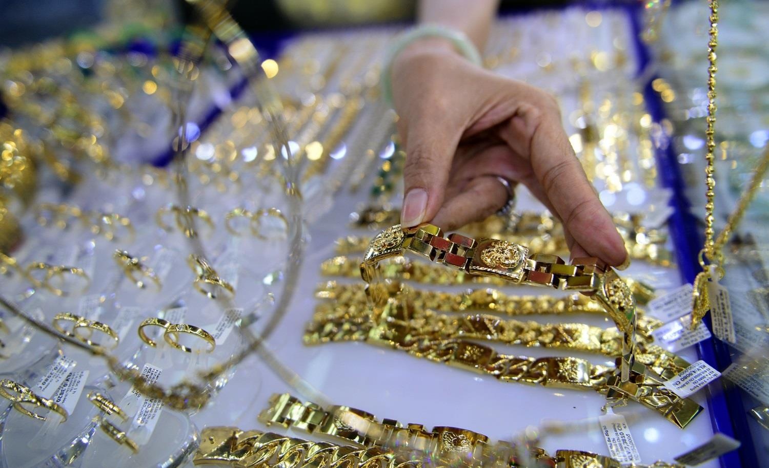 Gia vang se tiep tuc giam tuan toi? hinh anh