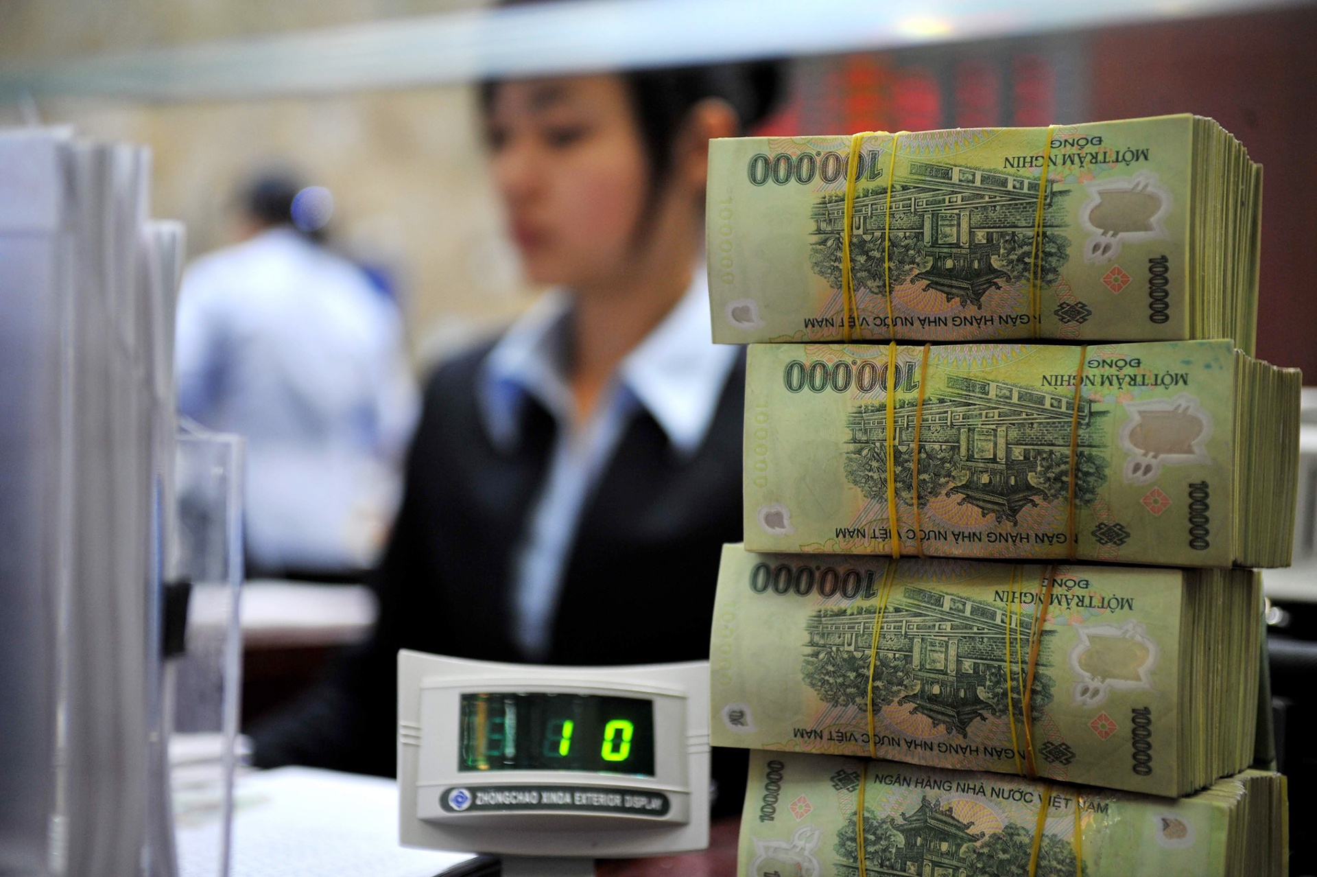 Nhom ngan hang quoc doanh se giam it nhat 40% loi nhuan hinh anh