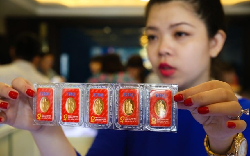 Vang giam nhe, nguoi mua lo nang hinh anh