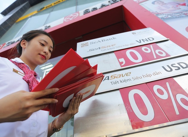 Lai suat tien gui se tiep tuc thap hinh anh