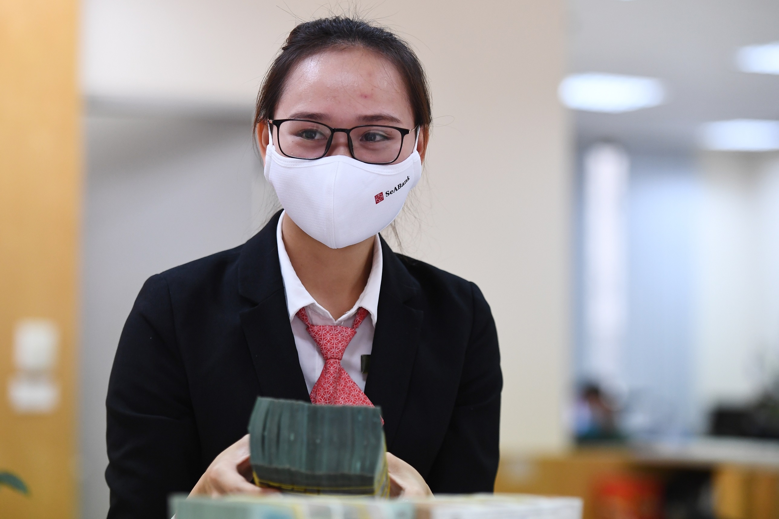 De xuat giam 50% tien thue cho ca nhan, ho kinh doanh nua cuoi nam hinh anh