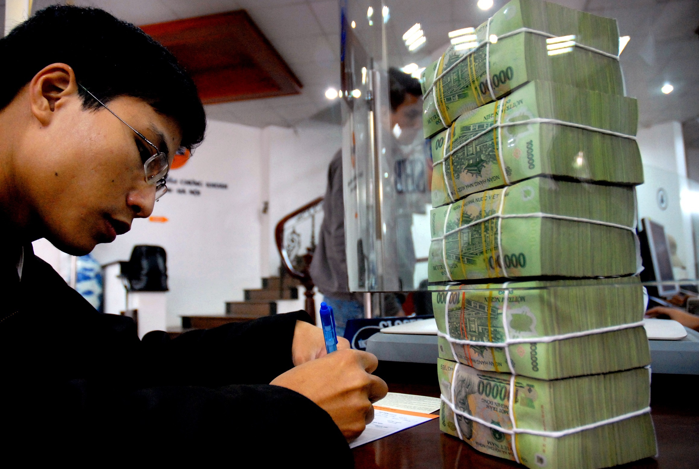 BSC: Cung tien va tin dung se tang 12-14% nam nay hinh anh