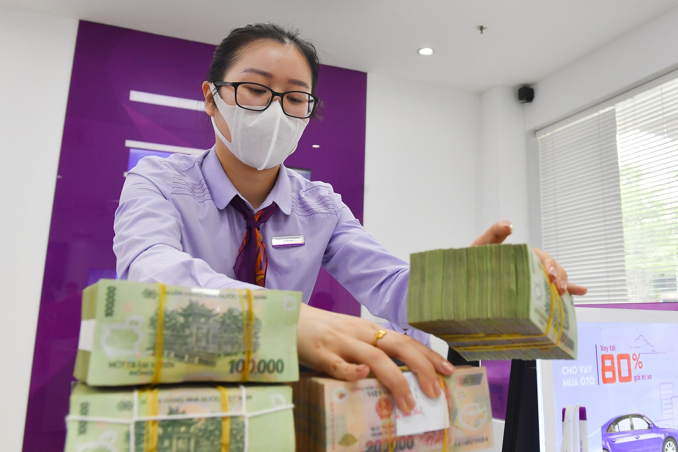 Ngan hang Nha nuoc lo lam phat anh huong lai suat cho vay hinh anh