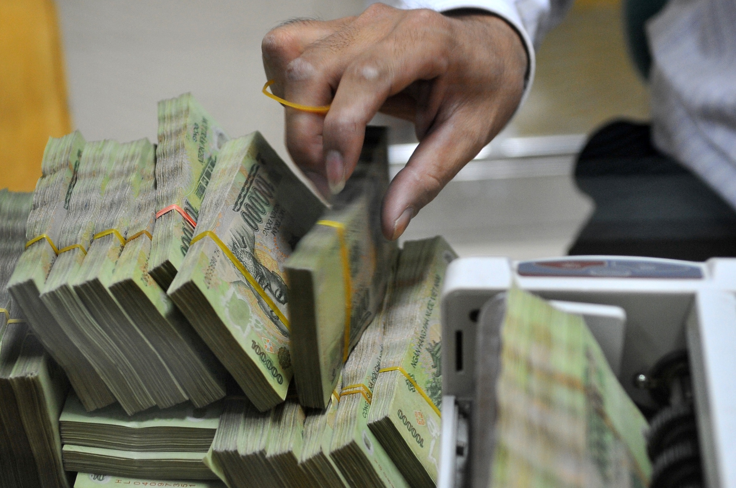 Ngan hang Nha nuoc rut ve them gan 100.000 ty dong hinh anh