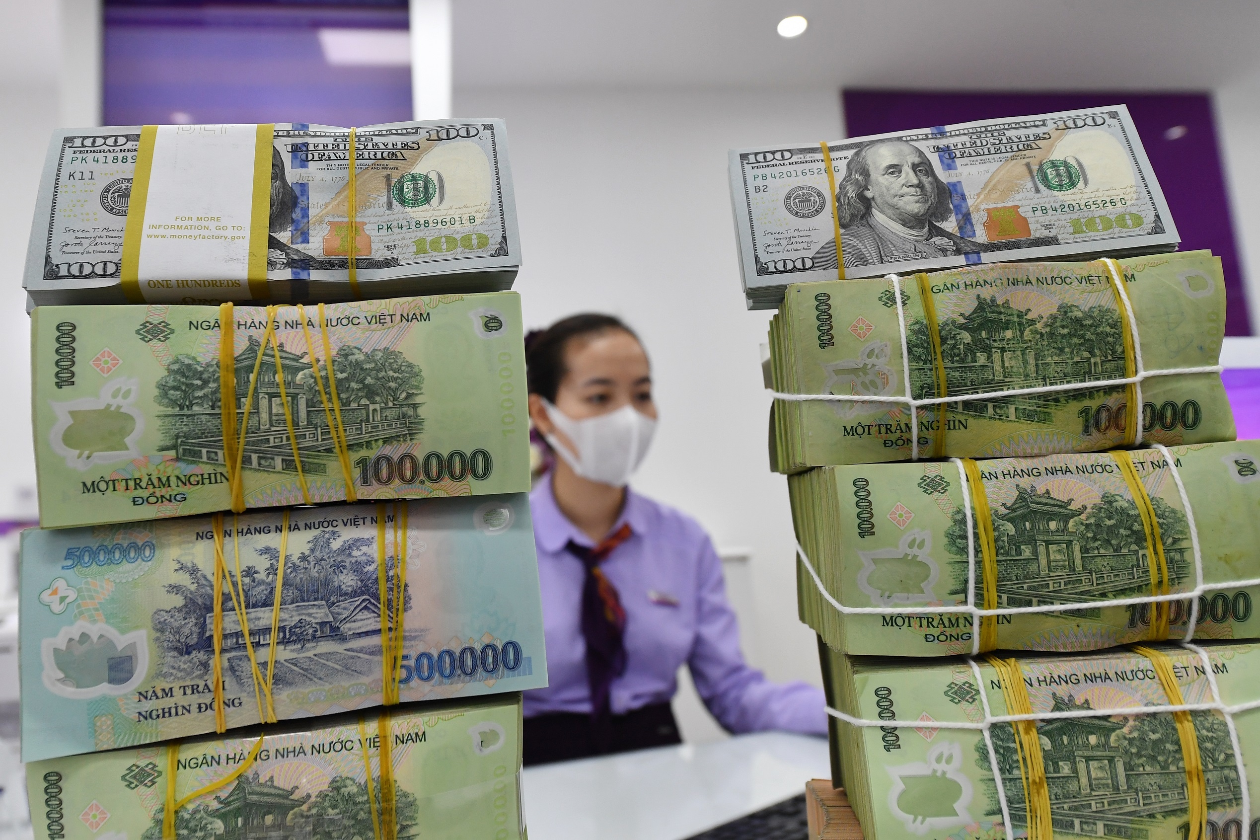 Rui ro tu hang chuc nghin ty no vay bang USD cua doanh nghiep hinh anh