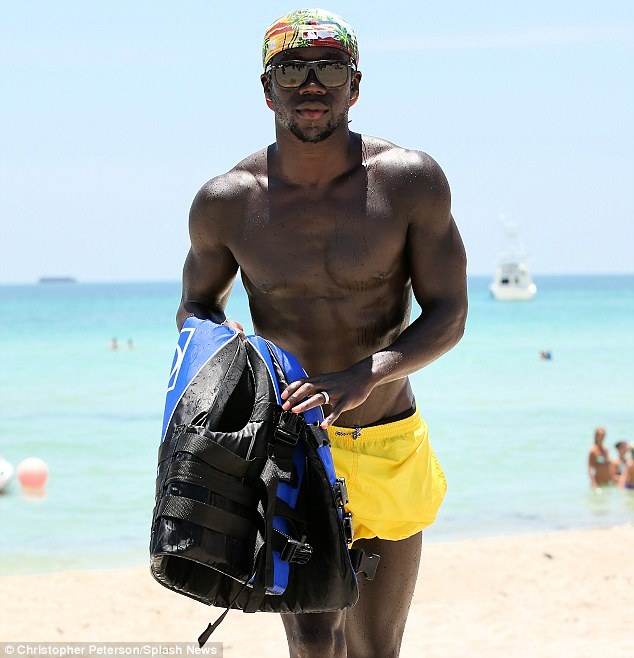 Bacary Sagna is continuing to unwind ahead of the new season after hitting Miami Beach with his wife Ludivine.  The Manchester City new boy has been afforded an extended holiday having made it to the quarter-finals of the World Cup with France.  And the 31-year-old is enjoying a Stateside break ahead of meeting his new team-mates.