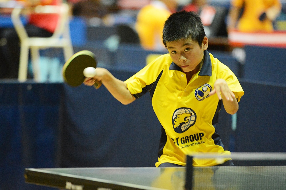VĐV Vũ Mạnh Huy, con trai danh thủ Vũ Mạnh Cường. Huy làm quen với bóng bàn từ năm 4 tuổi và hiện đang là 1 trong những VĐV xuất sắc nhất lứa tuổi Nhi đồng