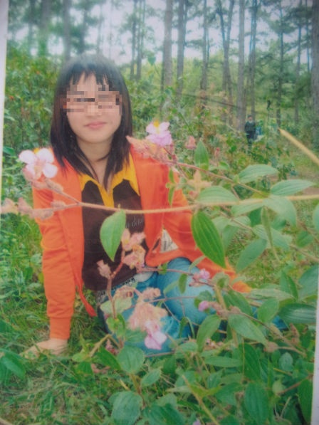 Di ảnh cô gái bị chết trong tư thế treo cổ giữa vườn điều.