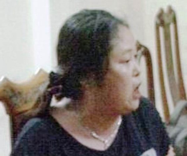 Nguyễn Thị Minh bị công an bắt giữ.