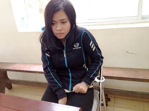 Vũ Thị Vân Anh tại cơ quan công an.