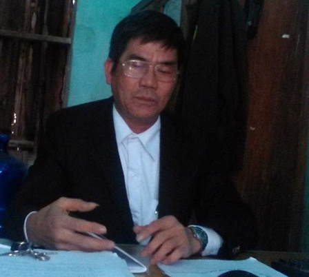 Ông Nguyễn Văn Dũng - Phó Công an xã Quế Nham trao đổi với PV.