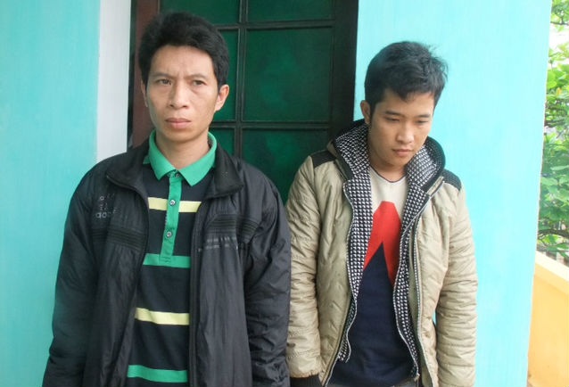 Nguyễn Văn Bình và Phạm Trung Chiến tại cơ quan công an.