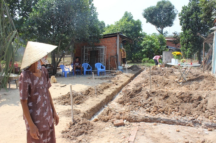 Lam nha cho gia dinh cach mang theo chi dao cua Bi thu Thang hinh anh